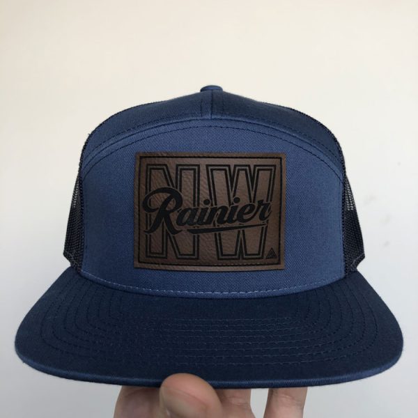 Navy seven-panel hat with a Rainier NW leather patch