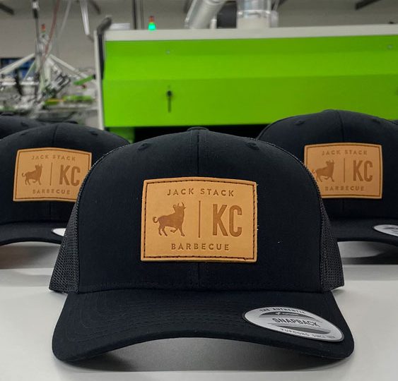 Black trucker hats with Jack Stack KC leather patches
