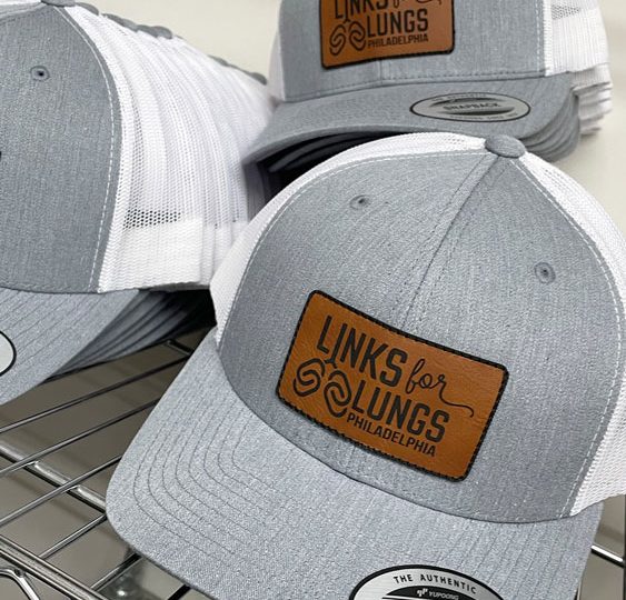 Gray trucker hats with Links for Lungs leather patches